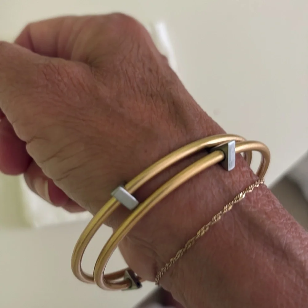 Pair of Gold tone Bangle Bracelets great stacked w/ additional bracelets